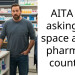 AITA for asking for space at the pharmacy counter?