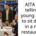 AITA for telling a young adult to sit down in a nice restaurant?