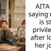 AITA for saying my gf is still privileged after losing her job?
