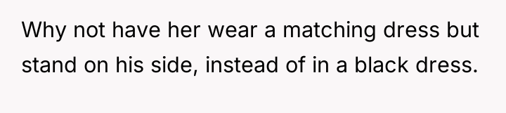 Why not have her wear a matching dress but stand...