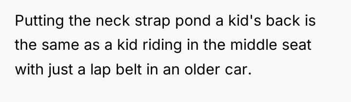 Putting the neck strap pond a kid's back is the...