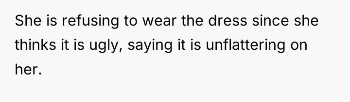 She is refusing to wear the dress since she thinks...