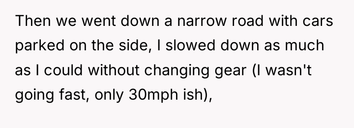 Then we went down a narrow road with cars parked...