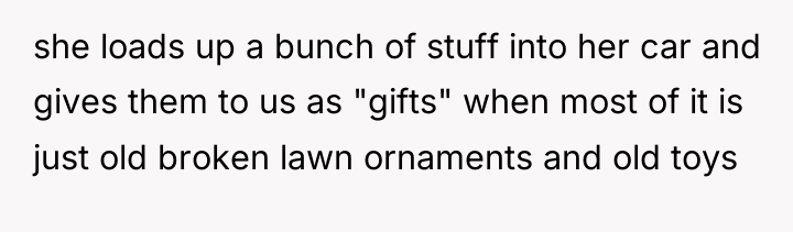 she loads up a bunch of stuff into her car...