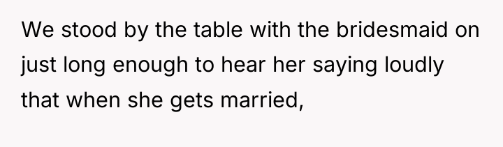 We stood by the table with the bridesmaid on just...