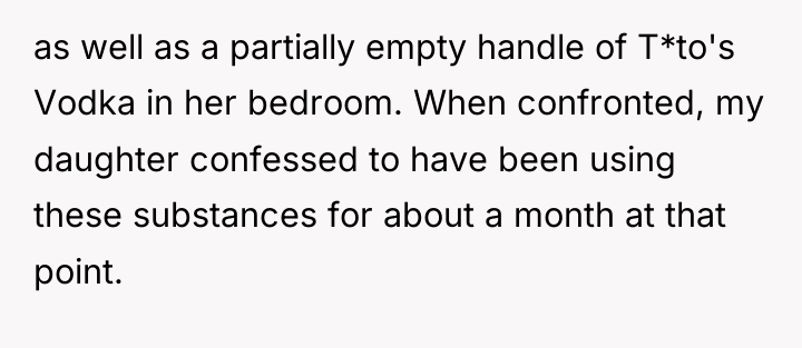 as well as a partially empty handle of T*to's Vodka...