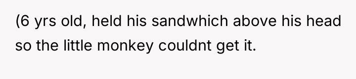 (6 yrs old, held his sandwhich above his head so...