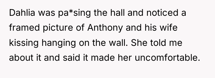 Dahlia was pa*sing the hall and noticed a framed picture...