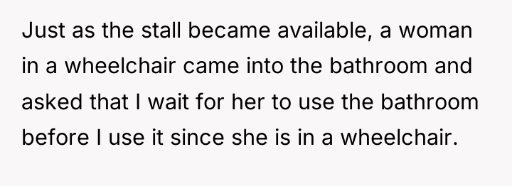 Just as the stall became available, a woman in a...