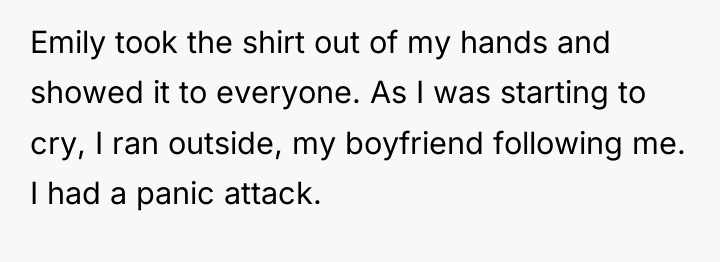 Emily took the shirt out of my hands and showed...