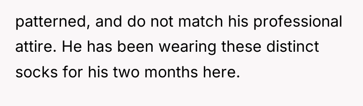 patterned, and do not match his professional attire. He has...