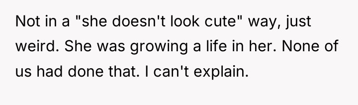 Not in a "she doesn't look cute" way, just weird....