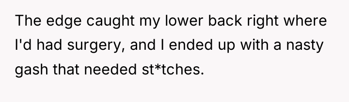 The edge caught my lower back right where I'd had...