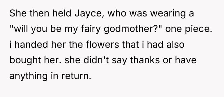 She then held Jayce, who was wearing a "will you...