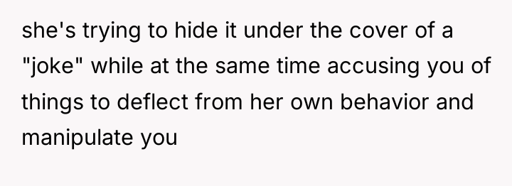 she's trying to hide it under the cover of a...