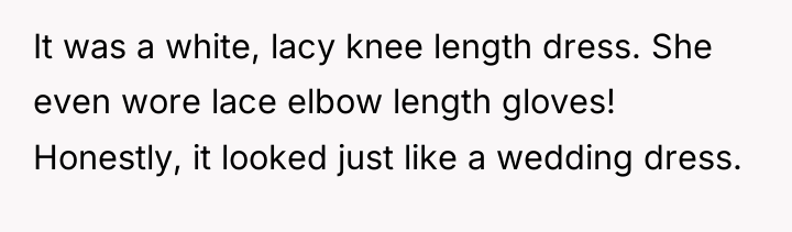 It was a white, lacy knee length dress. She even...