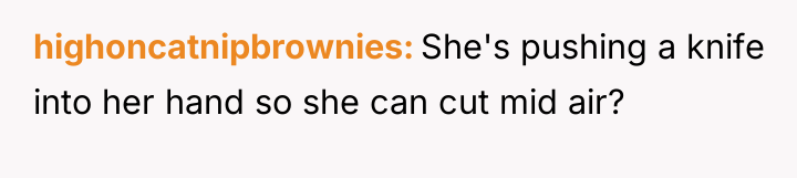 highoncatnipbrownies She's pushing a knife into her hand so she...
