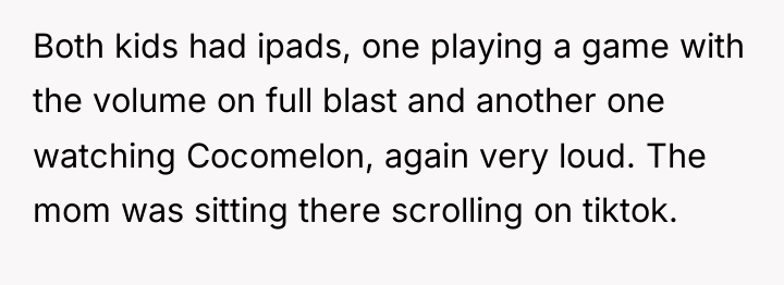 Both kids had ipads, one playing a game with the...