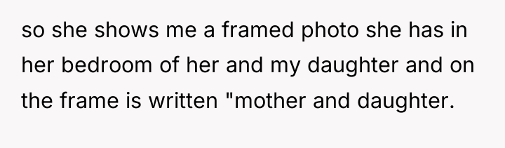 so she shows me a framed photo she has in...
