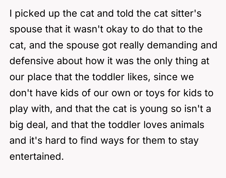 I picked up the cat and told the cat sitter's...