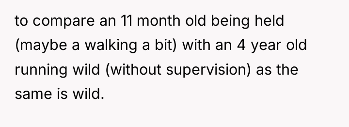 to compare an 11 month old being held (maybe a...