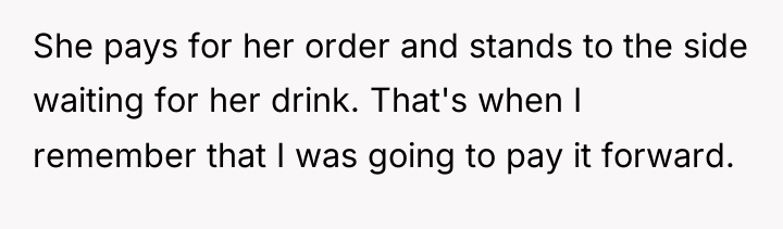 She pays for her order and stands to the side...