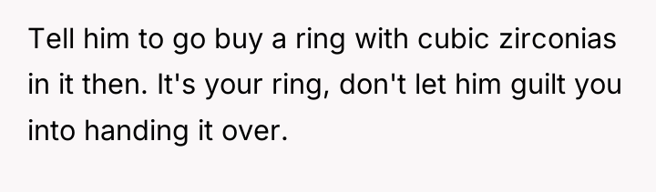 Tell him to go buy a ring with cubic zirconias...