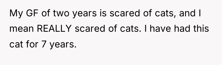 My GF of two years is scared of cats, and...