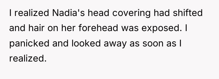 I realized Nadia's head covering had shifted and hair on...