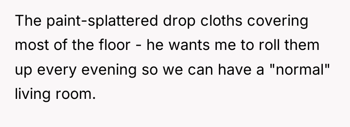 The paint-splattered drop cloths covering most of the floor -...