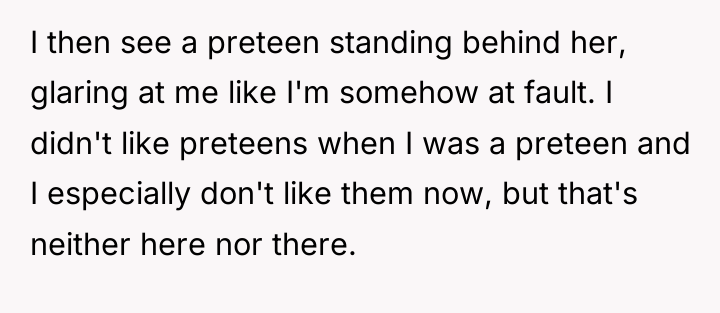 I then see a preteen standing behind her, glaring at...