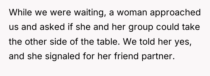 While we were waiting, a woman approached us and asked...