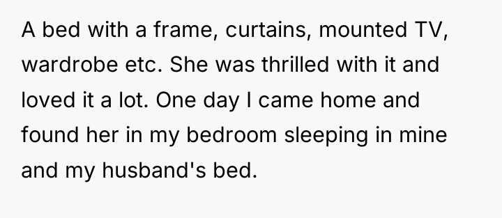A bed with a frame, curtains, mounted TV, wardrobe etc....