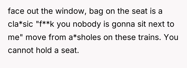 face out the window, bag on the seat is a...