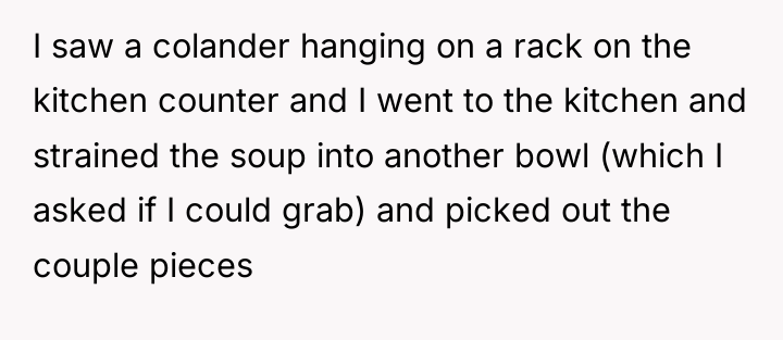 I saw a colander hanging on a rack on the...