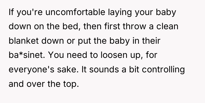 If you're uncomfortable laying your baby down on the bed,...