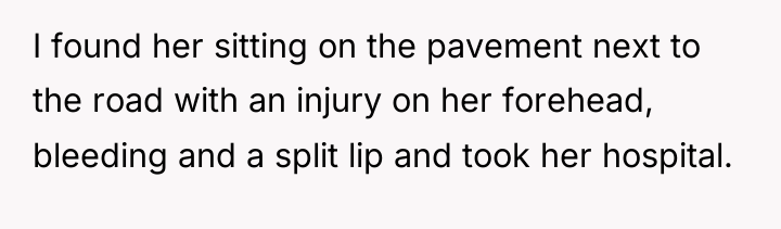 I found her sitting on the pavement next to the...