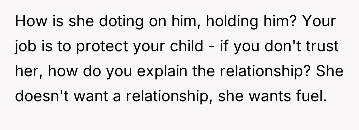 How is she doting on him, holding him? Your job...