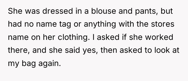 She was dressed in a blouse and pants, but had...