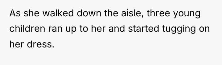 As she walked down the aisle, three young children ran...