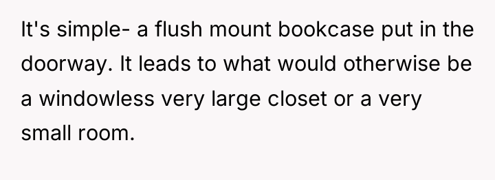 It's simple- a flush mount bookcase put in the doorway....