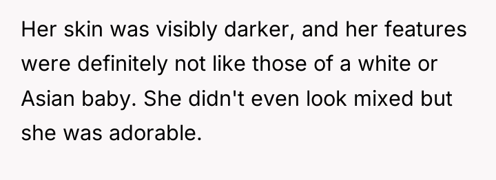 Her skin was visibly darker, and her features were definitely...