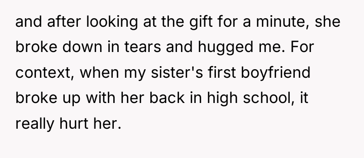and after looking at the gift for a minute, she...