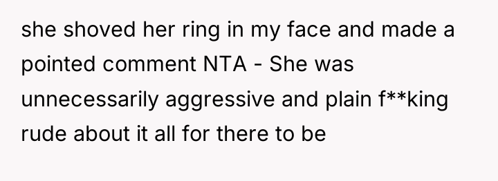 she shoved her ring in my face and made a...