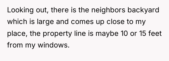 Looking out, there is the neighbors backyard which is large...