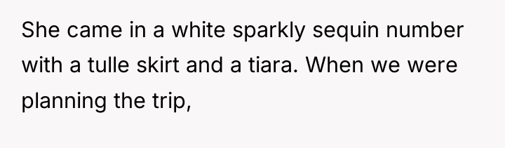 She came in a white sparkly sequin number with a...