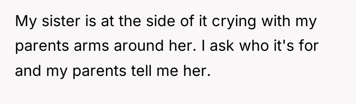 My sister is at the side of it crying with...