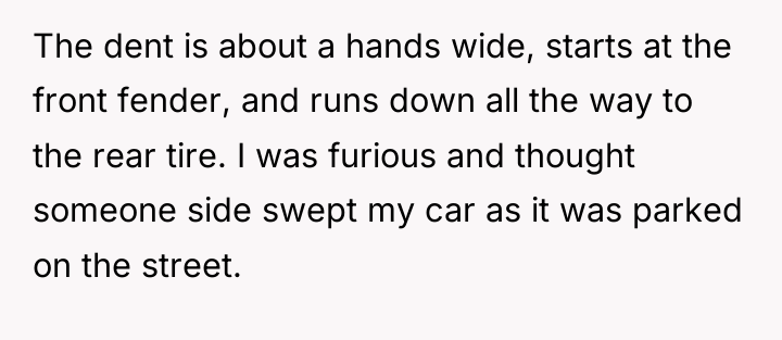 The dent is about a hands wide, starts at the...