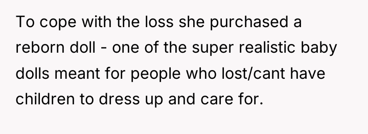To cope with the loss she purchased a reborn doll...