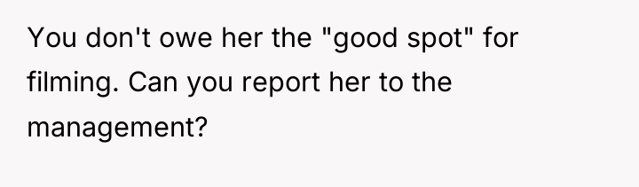 You don't owe her the "good spot" for filming. Can...
